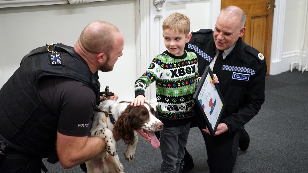Thor, PC Surridge, Leo Bowyer and ACC Damian Barratt