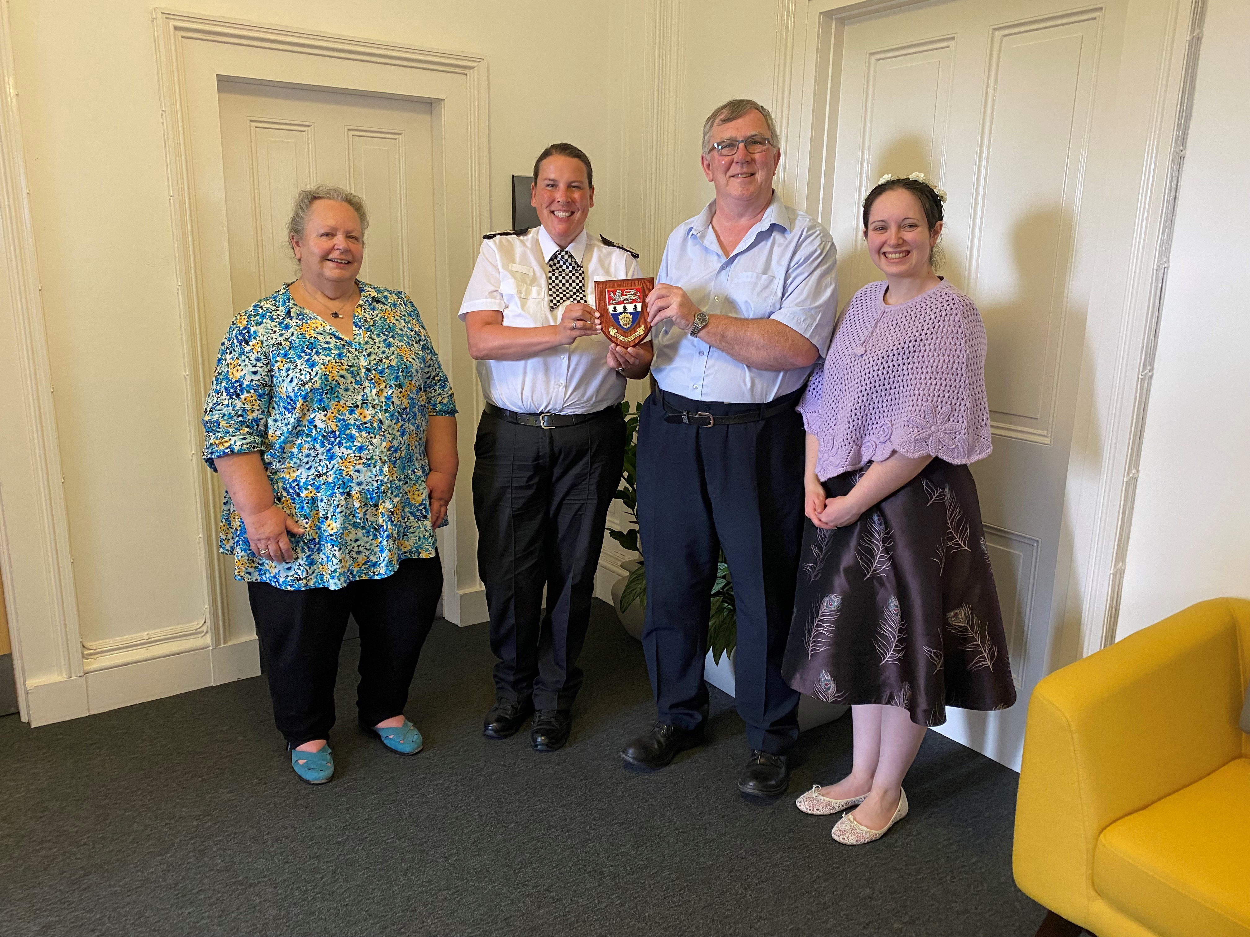 Tony Riggs and family with Chief Constable Pippa Mills