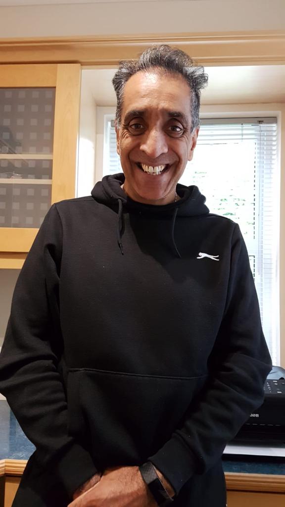 Man with short grey hair