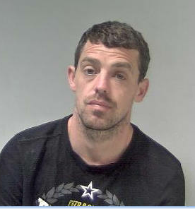 Man with short dark hair