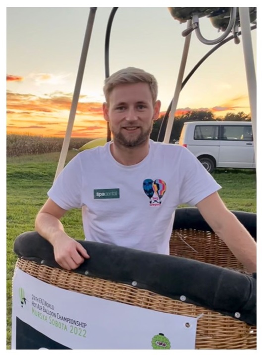 Peter Gregory a man with short blond hair wearing a white t-shirt