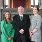 A group of people. Zoe Boucher on the left, speaker in the middle, Emily Butler on the right. 