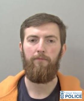 man in his 20's with beard 