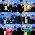 Police officers and staff receiving an award 