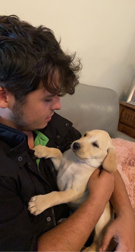 Dylan Price with puppy