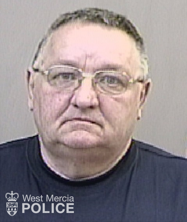 73 year old white man with glasses, frown and receding hair line