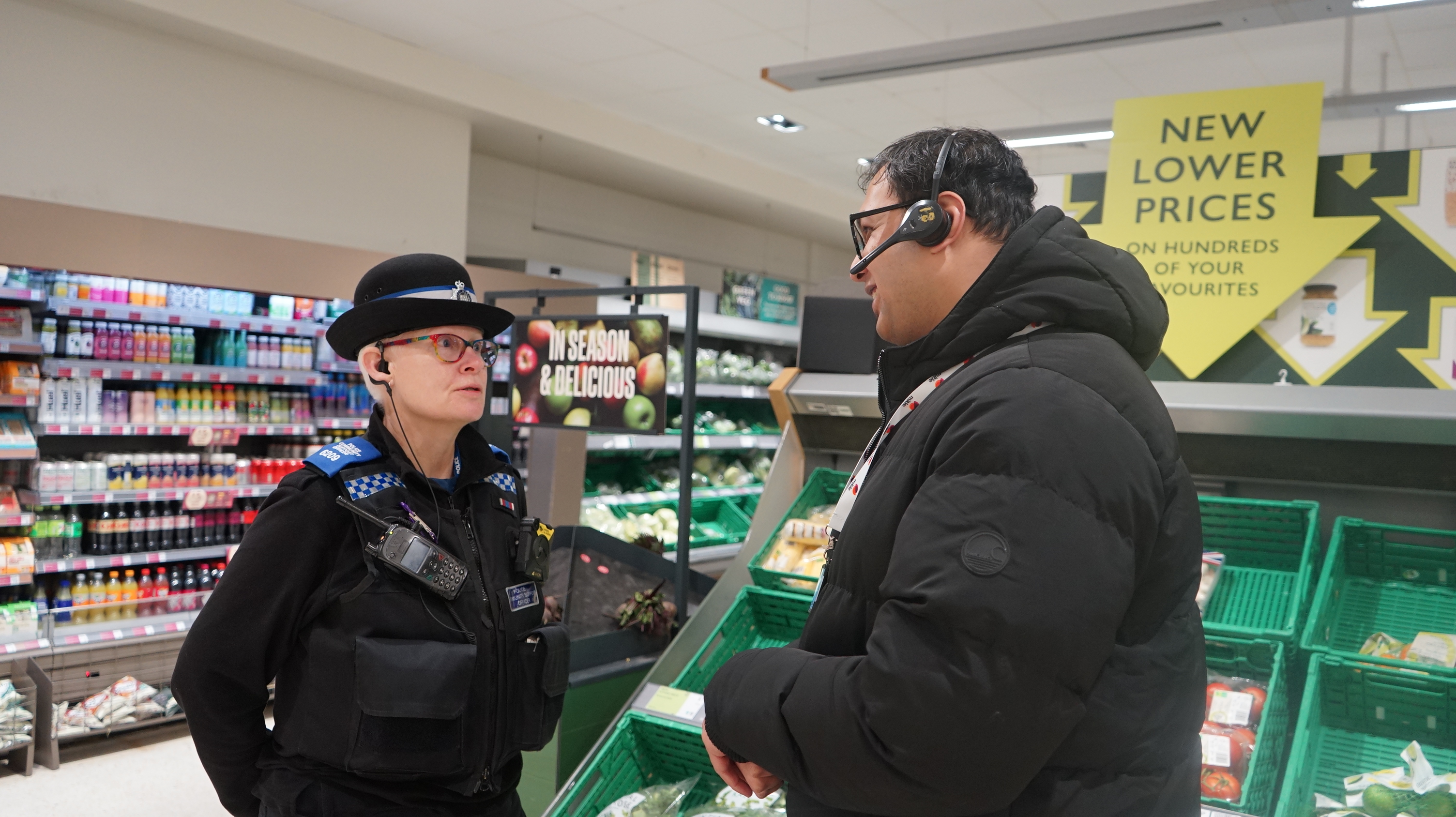 police officer talking to security officer