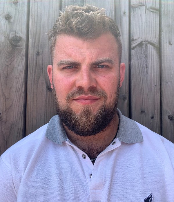 White male with light brown hair and beard.
