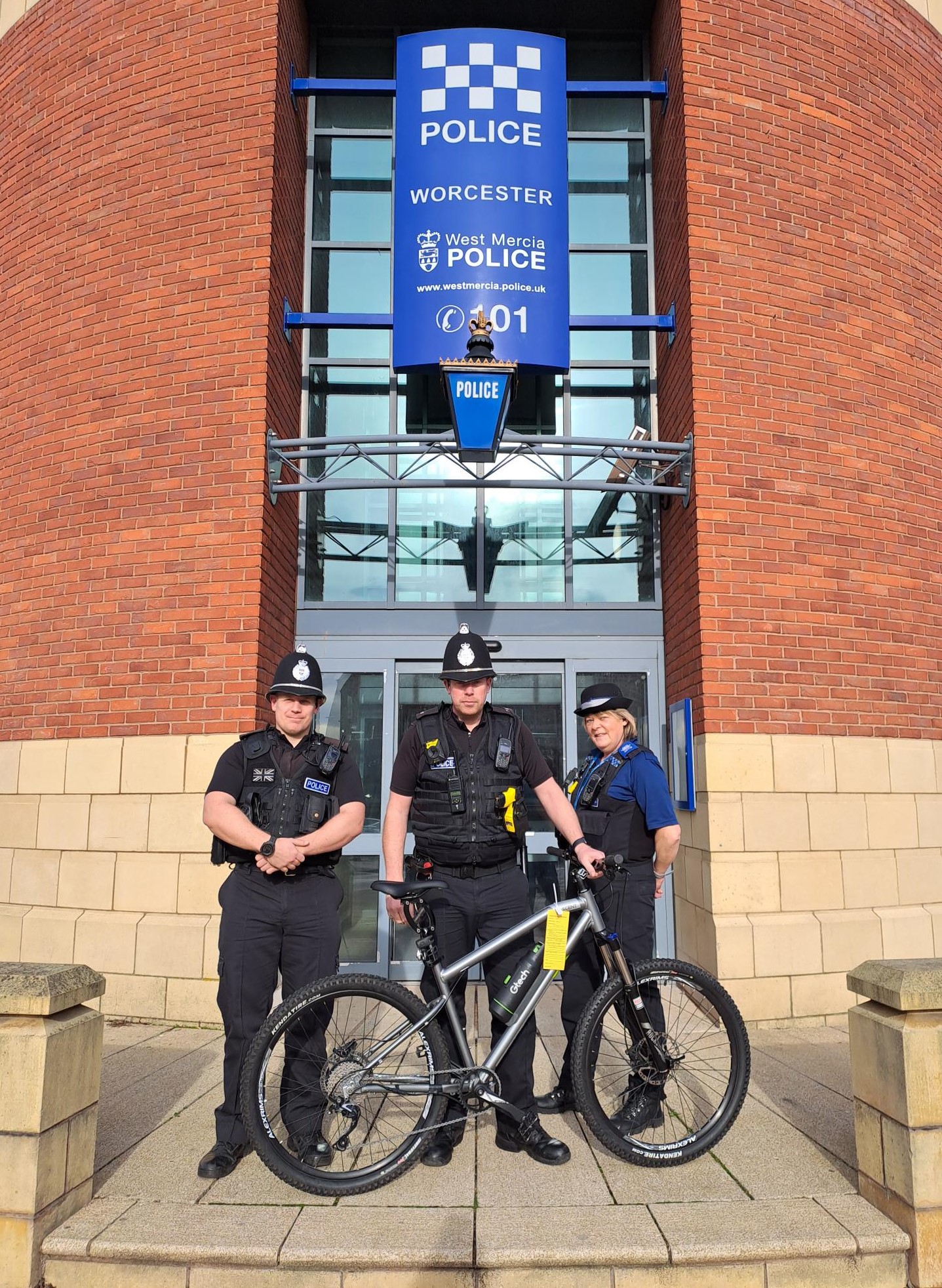 Officers with a recovered bike