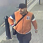 Man with black baseball cap