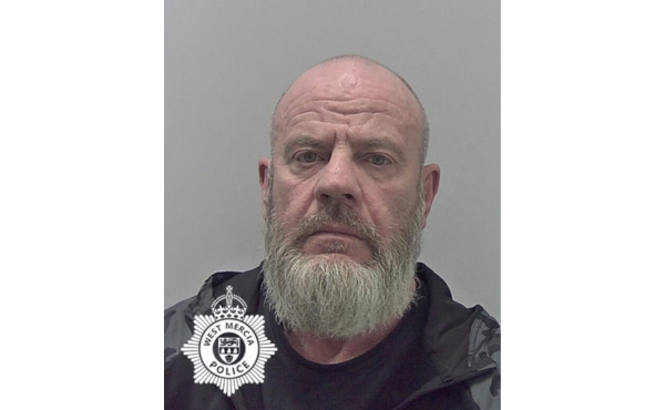 white man, 57, bald with beard 