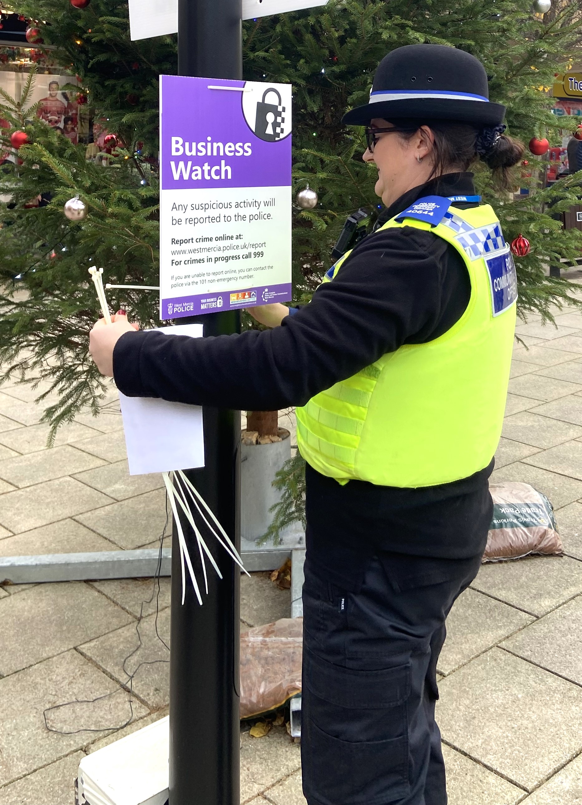 Officers and community members stood on high street. 
