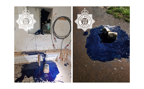 smashed window and spilt tin of paint on floor with smashed glass