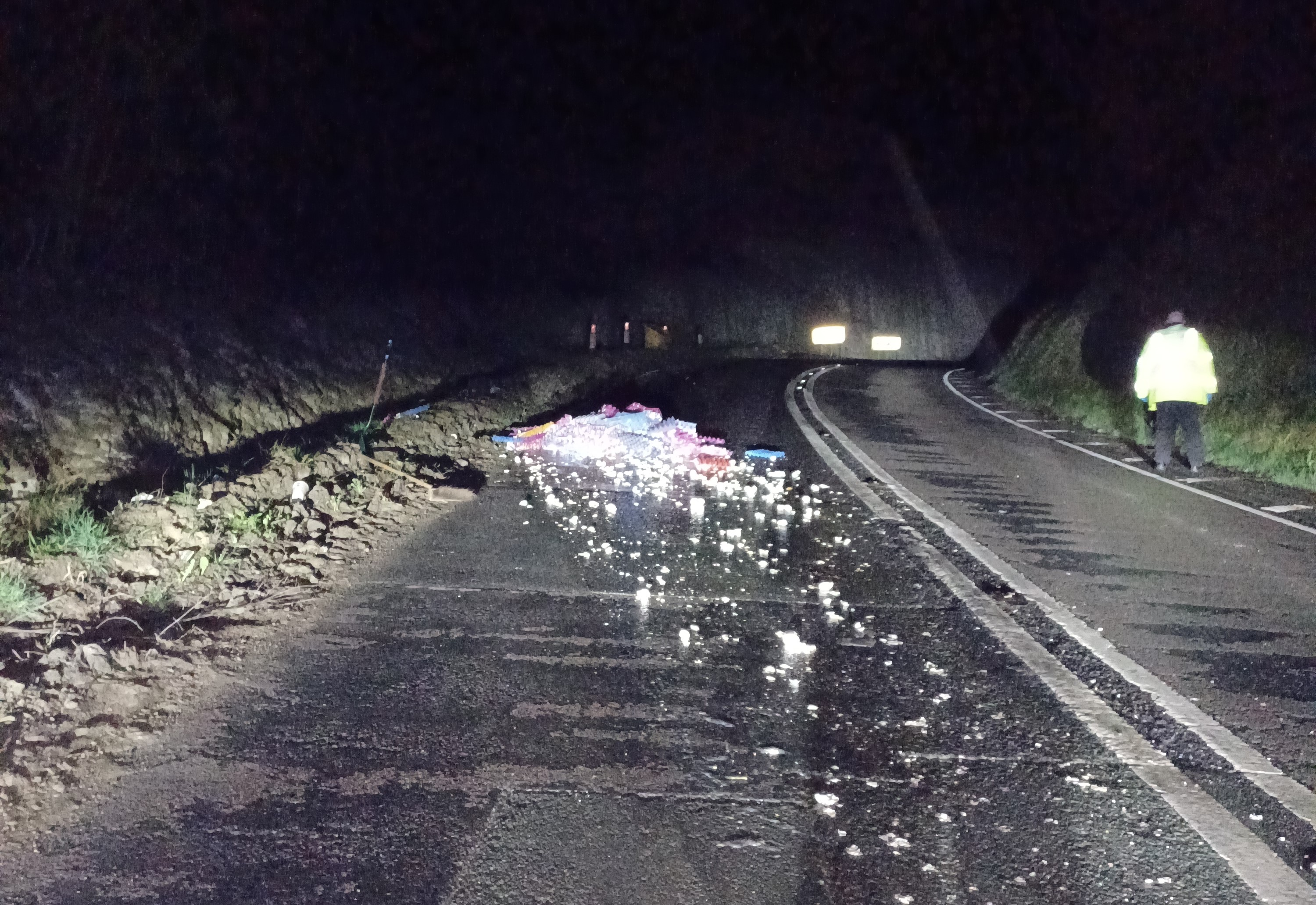 Eggs and boxes on a road. 