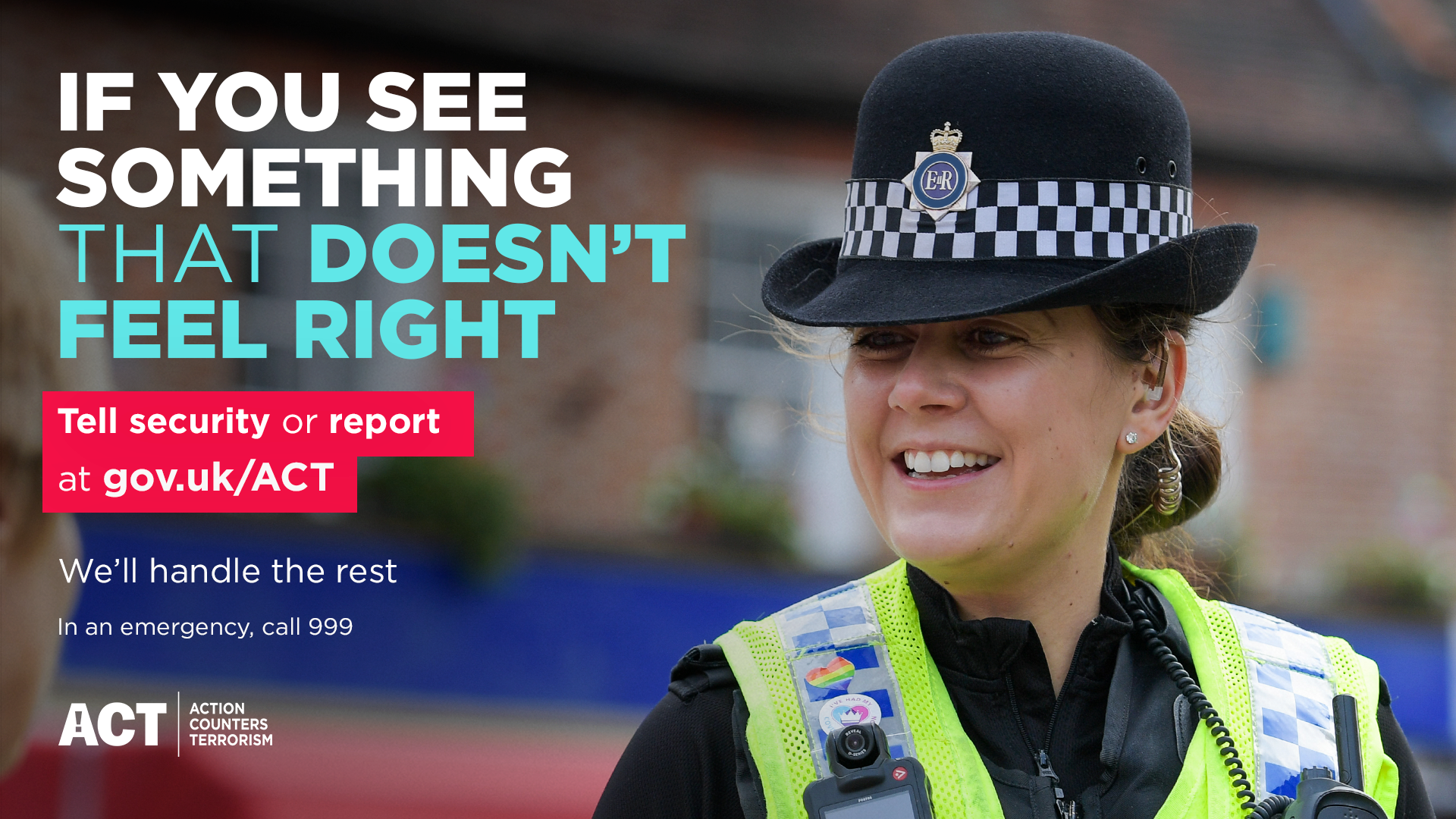 Female police officer with wording if you see something that doesn't feel right tell security