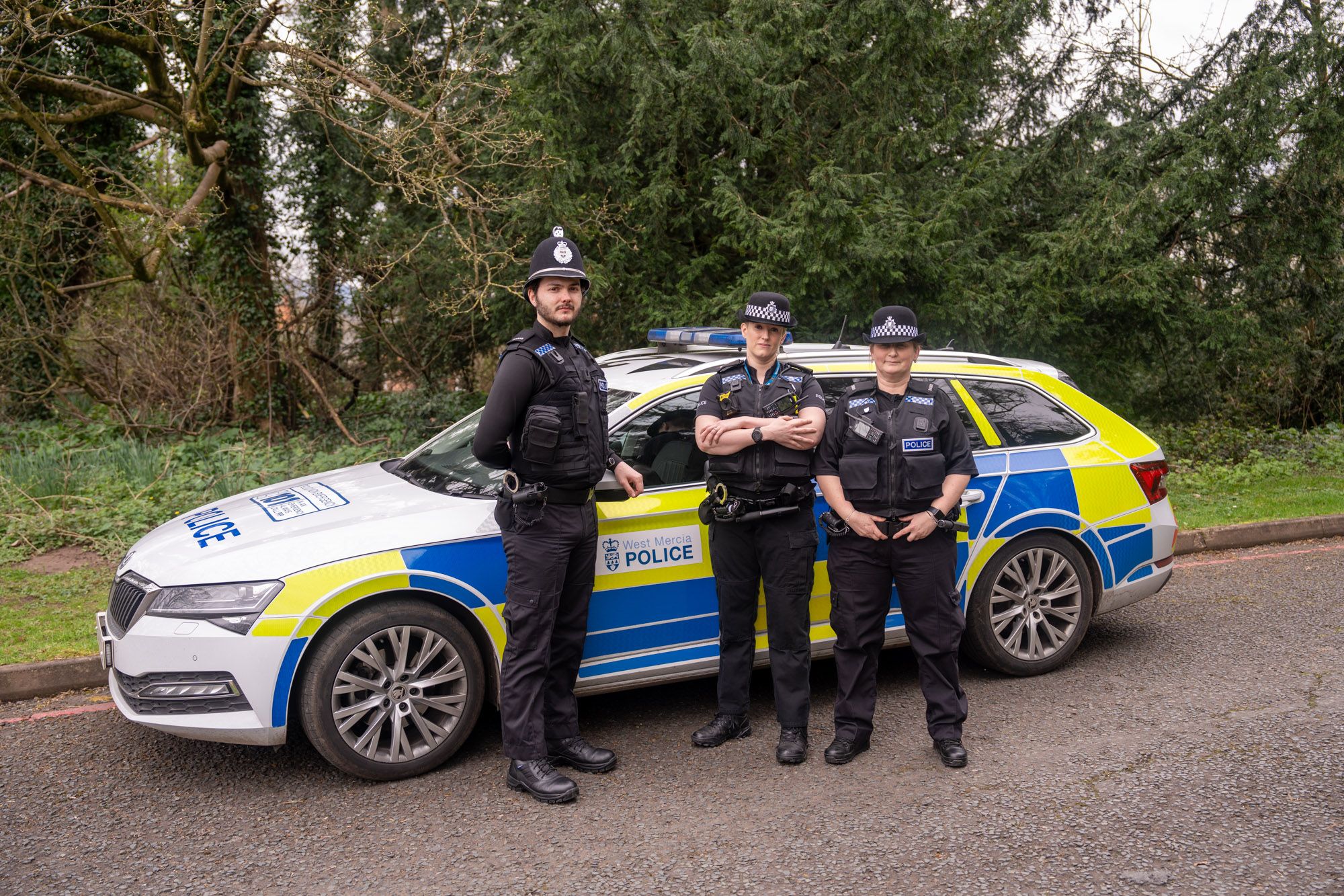 special constables stood by police car