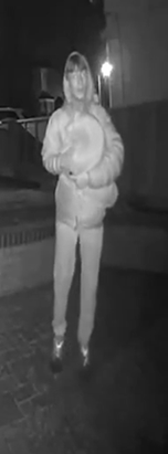 White man, wearing a hoodie and tracksuit bottoms. 