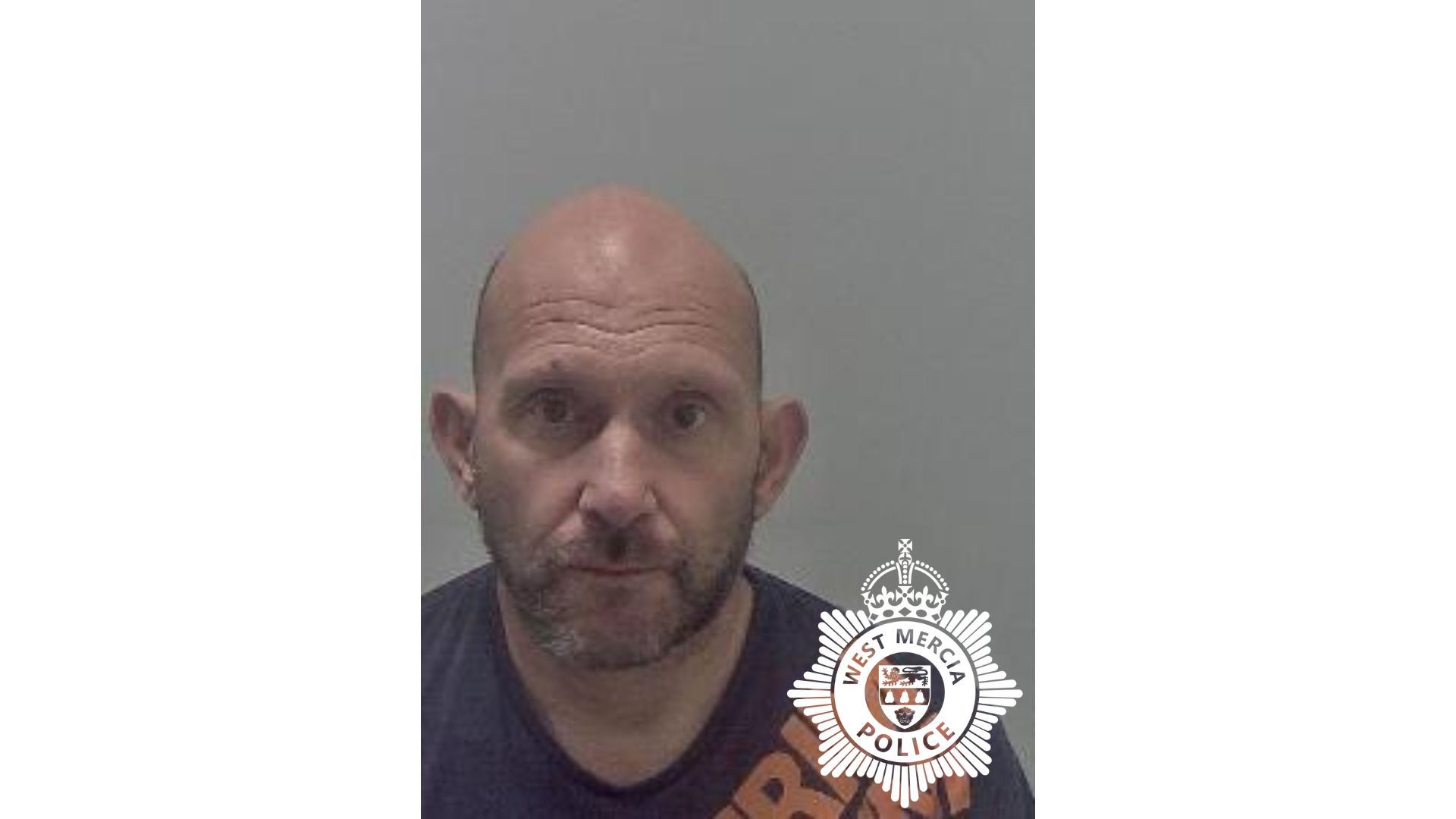 custody image of jason trundle - white bald man with facial hair