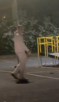 White male, with cream tracksuit. 