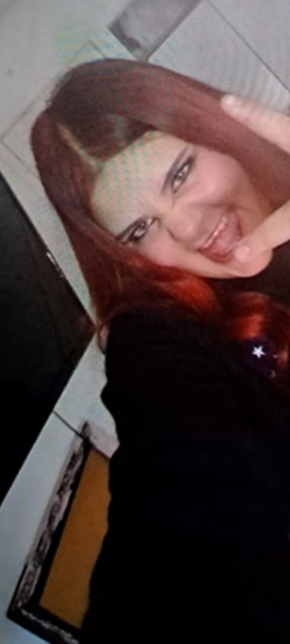 White female, long brown hair. 
