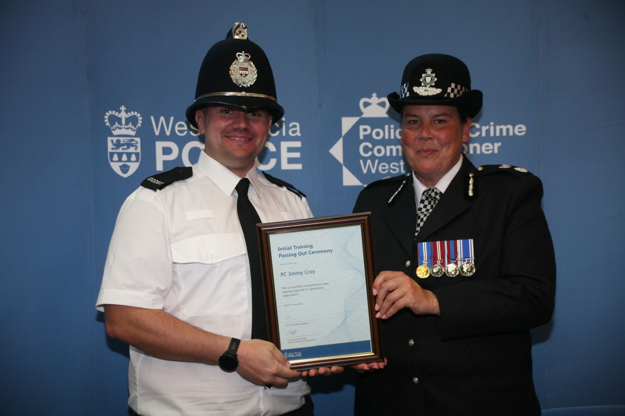 Image of PC Jimmy Croy and Chief Constable Pippa Mills at his passing out ceremony