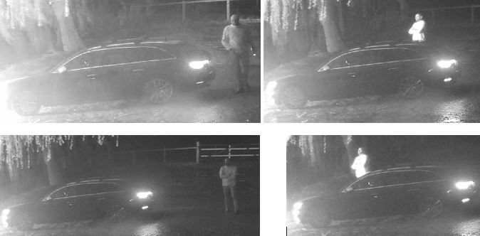 man stood next to a car 