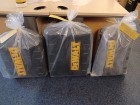 Three Dewalt power tool boxes.