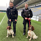 Police officers with their police dogs