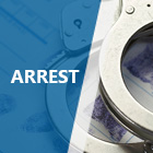 Handcuffs on a desk. 