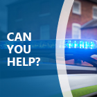Police car light, flashing blue.